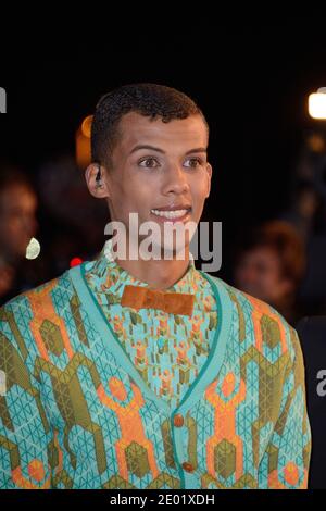 Stromae Teilnahme an den 15. NRJ Music Awards, die am 14. Dezember 2013 im Palais des Festivals in Cannes, Frankreich, stattfinden. Foto von Nicolas Briquet/ABACAPRESS.COM Stockfoto