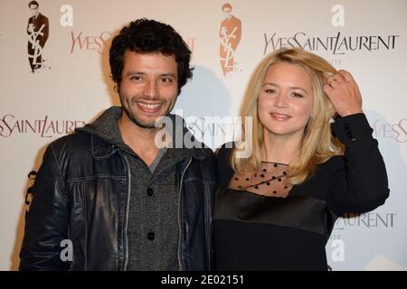 Mabrouk El Mechri und Virginie Efira bei der Premiere des Films Yves Saint Laurent im Kino UGC Normandie in Paris, Frankreich am 19. Dezember 2013 in Paris, Frankreich. Foto von Nicolas Briquet/ABACAPRESS.COM Stockfoto