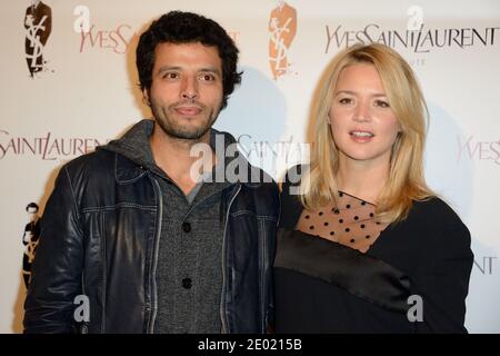 Mabrouk El Mechri und Virginie Efira bei der Premiere des Films Yves Saint Laurent im Kino UGC Normandie in Paris, Frankreich am 19. Dezember 2013 in Paris, Frankreich. Foto von Nicolas Briquet/ABACAPRESS.COM Stockfoto