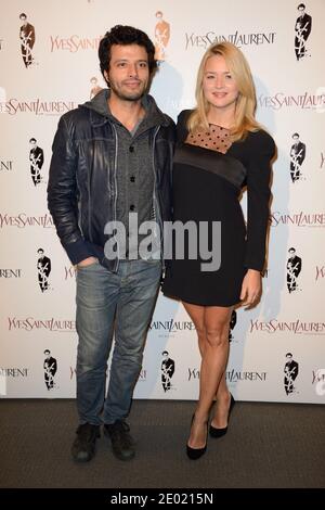 Mabrouk El Mechri und Virginie Efira bei der Premiere des Films Yves Saint Laurent im Kino UGC Normandie in Paris, Frankreich am 19. Dezember 2013 in Paris, Frankreich. Foto von Nicolas Briquet/ABACAPRESS.COM Stockfoto