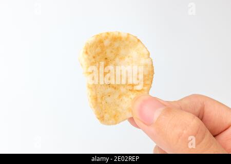 Süßigkeiten aus Reis auf weißem Hintergrund Stockfoto