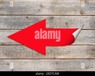 Roter Pfeil nach links als 3d - Abbildung auf einem Holzwand Stockfoto