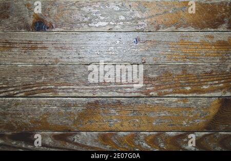 Alte Platten mit abblätternder Lackbeschichtung. Struktur und Hintergrund von Holzbrettern. Stockfoto