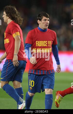 Lionel Messi aus Barcelona trägt T-Shirts zur Unterstützung von Bolton Wanderers' englischem Mittelfeldspieler Fabrice Muamba während des spanischen Fußballmatches La Liga, FC Barcelona gegen Granada im Camp Nou Stadion in Barcelona, Spanien am 20. März 2012. Barcelona gewann 5:3. Foto von Manuel Blondau/ABACAPRESS.COM Stockfoto