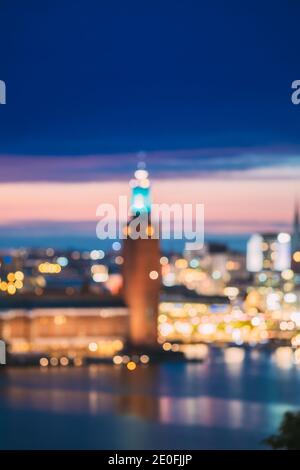 Stockholm, Schweden. Nacht Skyline Abstrakt Boke Bokeh Hintergrund. Designhintergrund. Turm Des Stockholmer Rathauses Stockfoto