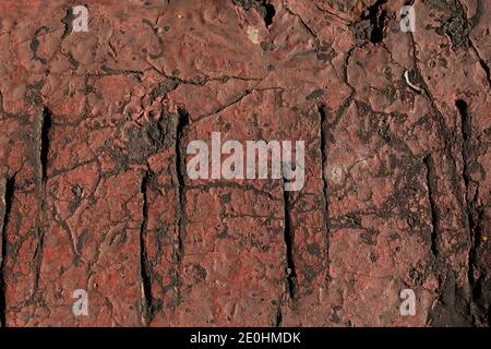 Hintergrund von Teer und schwere Farbe, rostrot rot und dunkelbraun industriellen Textur Hintergrund, horizontaler Aspekt Stockfoto