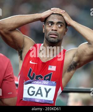 Der US-Spitzensprinter Tyson Gay und Jamaikas ehemaliger 100-Meter-Weltrekordhalter Asafa Powell haben Drogentests nicht bestanden. Gay, 30, der zweitschnellste Mann über 100 m, wurde am Freitag, den 12. Juli 2013 von der US-Anti-Doping-Agentur darüber informiert, dass seine A-Stichprobe aus einem Test außerhalb des Wettbewerbs im Mai ein positives Ergebnis gebracht hatte. Powell, der viertschnellste aller Zeiten, war positiv für ein verbotenes Stimulans bei den jamaikanischen Meisterschaften im Juni. File photo : USA's Tyson Gay nach dem Men's 100m Finale im Olympiastadion während der Olympischen Sommerspiele 2012 in London im Olympic Park in Stratford, London am 9. August 2012. Foto von Giulia Stockfoto