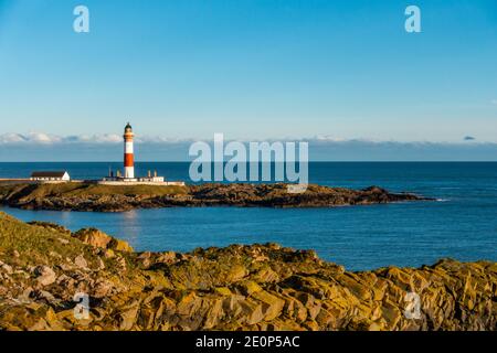 Der rot-weiße Leuchtturm im Dorf Boddam bei Peterhead in Aberdeenshire, Schottland, Großbritannien Stockfoto