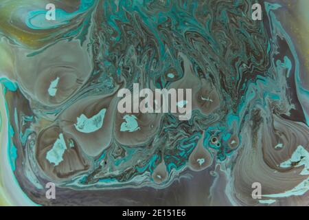 Malen mit Farben in Wasser in türkis-braunen Tönen, Aquarell-Textur Stockfoto