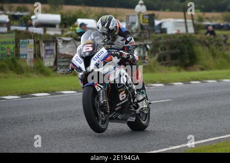 Michael Dunlop auf dem TAS Tyco BMW Superbike im Ulster Grand Prix 2019 Stockfoto