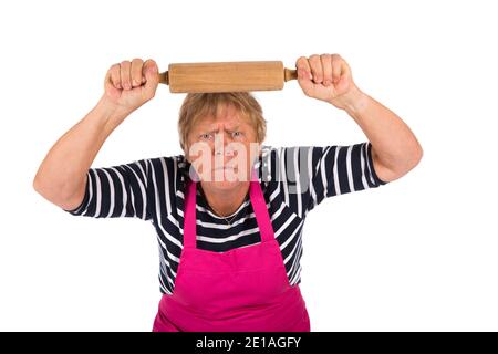 Sehr verärgerte ältere Frau mit Nadelrolle isoliert über weiß Hintergrund Stockfoto