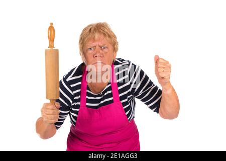 Sehr verärgerte ältere Frau mit Nadelrolle isoliert über weiß Hintergrund Stockfoto