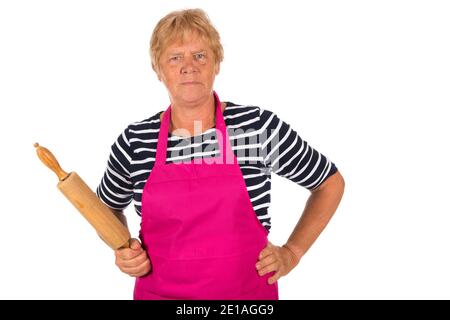 Sehr verärgerte ältere Frau mit Nadelrolle isoliert über weiß Hintergrund Stockfoto