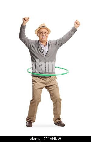 In voller Länge Porträt eines aufgeregt älteren Mann Spinnen ein hula Hoop isoliert auf weißem Hintergrund Stockfoto