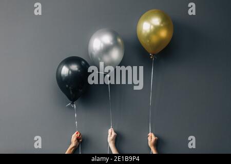 Schwarze Silber und Gold Ballons Stockfoto