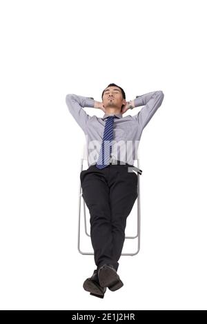 Ein fröhlicher junger Geschäftsmann Sitzhaltung hohe Qualität Foto Stockfoto