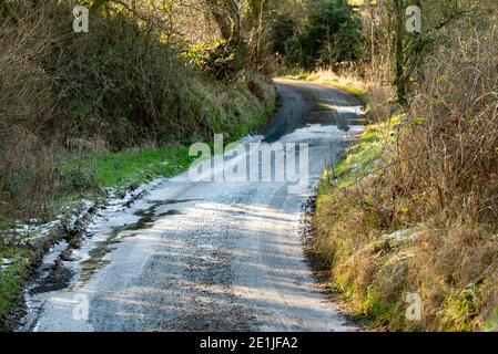 Eine gefrorene Landstraße, Bowland-mit-Leagram, Chipping, Preston, Lancashire. VEREINIGTES KÖNIGREICH Stockfoto