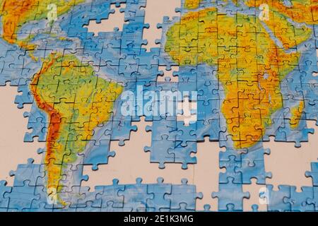 Puzzle der Karte der Welt. Touristischer Hintergrund Stockfoto