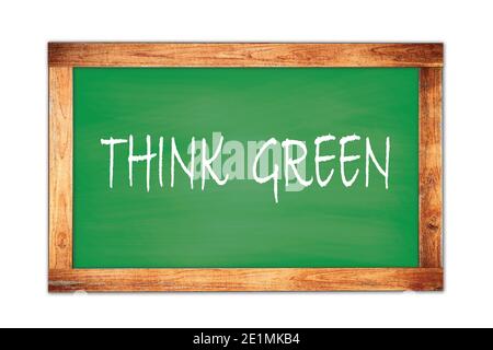 DENKEN SIE GRÜNEN Text auf grünen Holzrahmen Schule Tafel geschrieben. Stockfoto