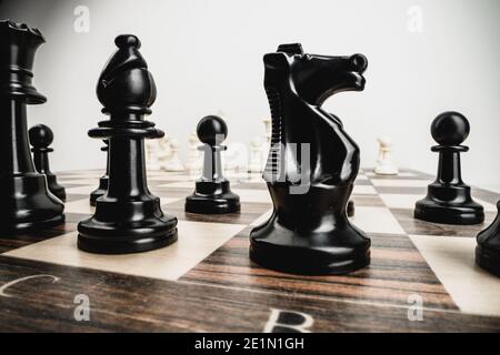 Macro photo of chess pieces on a chess board Stockfoto