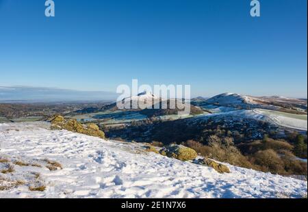 Caer Caradoc, Hazler Helmeth Hill, Hill und Hope Bowdler Hill aus Ragleth Hill am frühen Abend Licht gesehen, Church Stretton, Shropshire Stockfoto