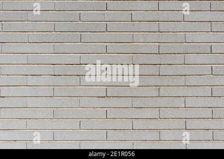 Echte moderne graue ökologische Backsteinwand Hintergrundstruktur. Mauerwerk. Stockfoto
