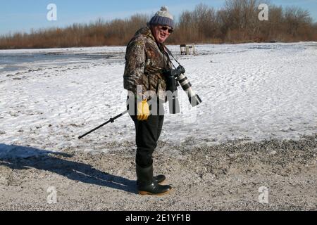 Fotograf zu Fuß auf Gull Island Stockfoto