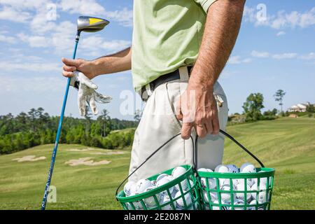 Alabama Greenville Cambrian Ridge Golf Course, Robert Trent Jones Golf Trail Golfspieler üben Driving Range, Balls Club Handschuh, Stockfoto