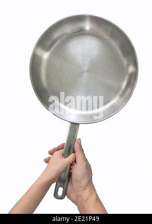Edelstahl Pfanne braten oder Pfanne mit Kinderhände halten Sie den Griff, Erwachsene Handauflage unter der Hand des Kindes. Draufsicht, Einzelbild Stainle Stockfoto