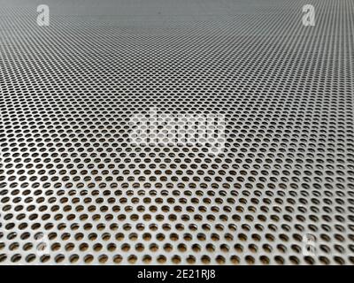 Lochblech aus rostfreiem Stahl, ideal für Industriebroschüren Hintergrund Stockfoto