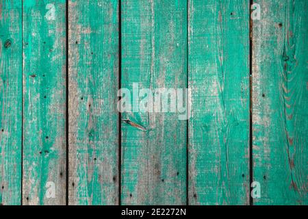 Alte verzweifelte rustikale Holzplanken Wand mit abgenutzten grünen Farbe, grunge Holz Textur oder Hintergrund Stockfoto