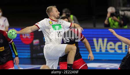 Köln, Deutschland. 10. Jan, 2021. firo: 10.01.2021, Handball: EHF Euro 2022 Qualifiers, Qualifikation, Nationalmannschaft Deutschland - Österreich Julius KUHN, GER, Duelle Quelle: dpa/Alamy Live News Stockfoto