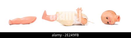 Zerbrochene alte Puppe, isoliert auf weißem Hintergrund Stockfoto