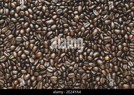 Kaffeebohnen als Hintergrund. Gerösteter Kaffee. Stockfoto