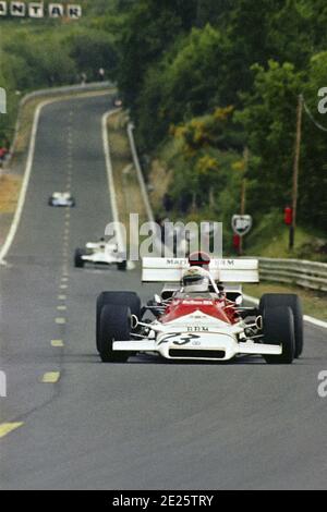 Howden GANLEY fährt während des Grand Prix de France 1972 auf der Strecke Charade bei Clermont-Ferrand mit dem BRM F1 in voller Geschwindigkeit auf der aufsteigenden Geraden. Stockfoto