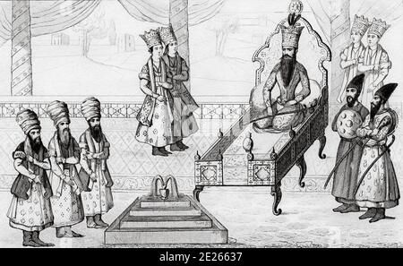 Persischer König, der auf seinem Thron sitzt, umgeben von seinem Hof. Fath Ali Sah, Fat′h Ali Shah, Fathalishah, Fathali Shah, Fath-Ali Shah Qajar oder Sha Fat Ali (25 de septiembre de 1772 - 23 de octubre de 1834). Iran. Alter Stahl graviert antiken Druck. Veröffentlicht in L'Univers La Perse, in 1841. Geschichte des alten persischen Reiches Stockfoto