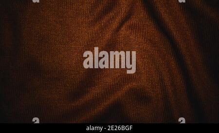 Schöne Stoff Hintergrund für Komfort, golden orange Seide Hintergrund, Textil-Textur. Der Hintergrund ist Stoff. Stockfoto