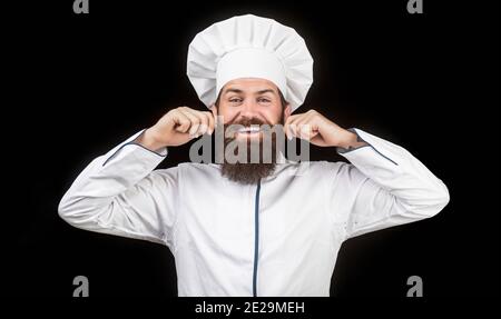 Kochmütze. Bärtiger Koch, Köche oder Bäcker. Bärtige Köche isoliert auf schwarz. Lustige Koch mit Bart kochen. Bartmann und Schnurrbart tragen Lätzchen Schürze Stockfoto