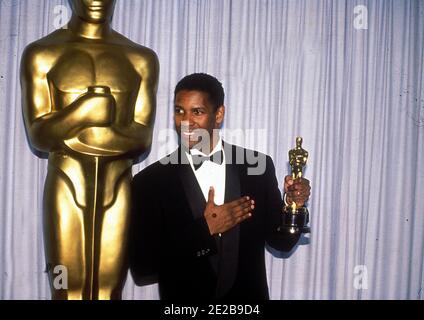 Denzel Washington bei der 62. Verleihung der Academy Awards am 26. März 1990 in Los Angeles, CA. Quelle: Ralph Dominguez/MediaPunch Stockfoto