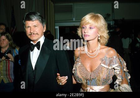 Charles Bronson und Ehefrau Jill Irland 1982 Quelle: Ralph Dominguez/MediaPunch Stockfoto