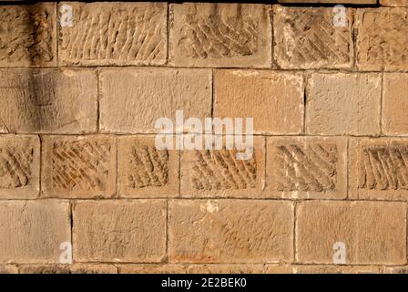 Alte Sandstein Wand Oberfläche Nahaufnahme als Stein Hintergrund Stockfoto