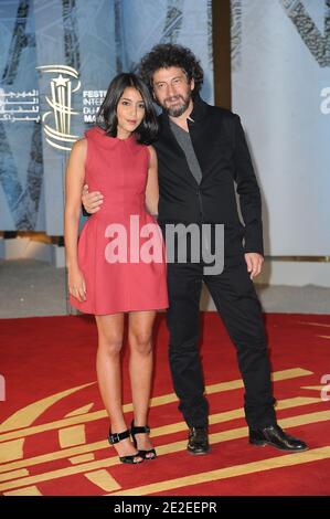 Leila Bekhti und Radu Mihaileanu kommen zum 11. 'Marrakech Film Festival' vor der Vorführung von 'Paris bei Nacht' in Marrakesch, Marokko am 4. Dezember 2011. Foto von Nicolas Briquet/ABACAPRESS.COM Stockfoto