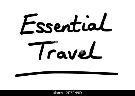 Essential Travel, handgeschrieben auf weißem Hintergrund. Stockfoto