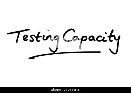 Testkapazität handschriftlich auf weißem Hintergrund. Stockfoto