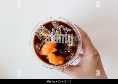 Saft, Orangensaft und Espresso mit Orangenschale Stockfoto