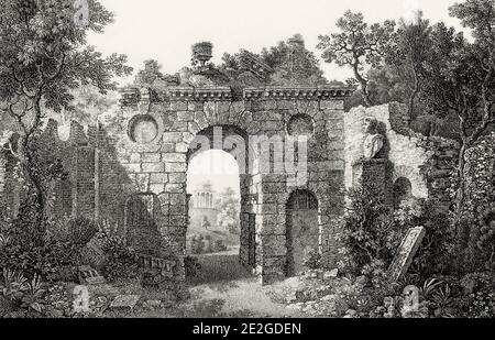 Der 'Ruined Arch', der 1759-60 als nachgebaute römische Ruine in Kew Gardens erbaut wurde, wurde von Sir William Chambers (1723-1796), einem schottisch-schwedischen Architekten mit Sitz in London, entworfen. Seine bekanntesten Werke sind Somerset House und Kew Gardens, London England. Einige seiner Kew Garden Gebäude sind verloren gegangen, die restlichen sind die zehnstöckige Pagode, die Orangerie, der ruinierte Bogen, der Tempel von Bellona und der Tempel von Aeolus. Stockfoto