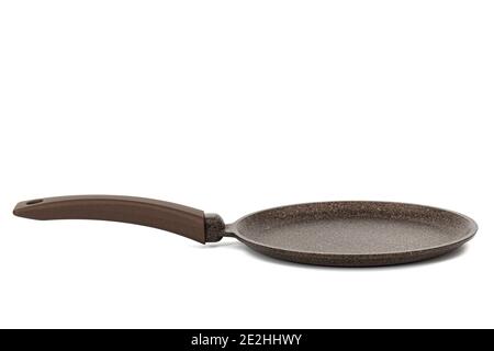 Braune Bratpfanne mit Antihaftbeschichtung, isoliert auf weißem Hintergrund Stockfoto