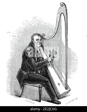 Mr. Roberts, The Welsh Harper, 1844. Harfenist mit Sehbehinderung: "...der durch seine bewundernswerte Leistung alle unsere besten Erinnerungen an die Barden von alten erweckt. Obwohl völlig des Sehens beraubt, scheint dieser Sinnverlust in der erstaunlichen Vollkommenheit seines musikalischen Gehörs reichlich gesühnt worden zu sein. Er hat die Hauptpreise beim Estefodd [eisteddfod] gewonnen und ist mit einer Fülle von Harfen, Medaillen, &amp;c., die Trophäen seiner Triumphe geschmückt...Er gilt als der beste harper in Wales'. Aus "Illustrated London News", 1844, Vol Stockfoto