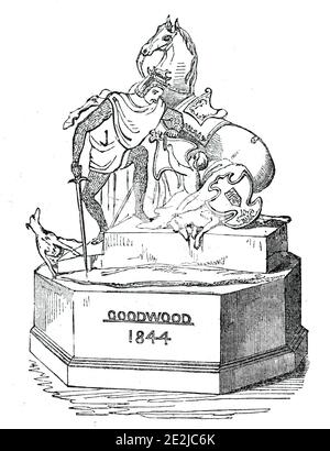 Preisschild, 1844. Pferderennen Trophäe als Preis auf Goodwood Racecourse: "...die rührende Legende von Llewellyn, der, nachdem er traf seinen Hund Gelert mit Blut bedeckt, folgert, dass er sein Kind zerstört hat, und stürzt sein Schwert in sein Herz; Die Tatsache, dass der Hund das Leben des Kindes gerettet hatte, indem er einen Wolf zerstörte, mit dessen Blut er bedeckt ist; welcher Wolf, aber für den Mut und die Treue des Hundes, hätte das Kind getötet. Die Gruppe umfasst ein Pferd, Llewellyn umarmt sein Kind, den sterbenden Hund, und der tote Wolf'. Aus "Illustrated London News&quo Stockfoto