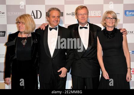 Festspielpräsident Remi Depoix und seine Frau Ari Vatanen und seine Frau beim 25. Internationalen Automobilfestival, das am 04 2010. Februar im Hotel des invalides in Paris, Frankreich, stattfand. Foto von Nicolas Genin/ABACAPRESS.COM Stockfoto